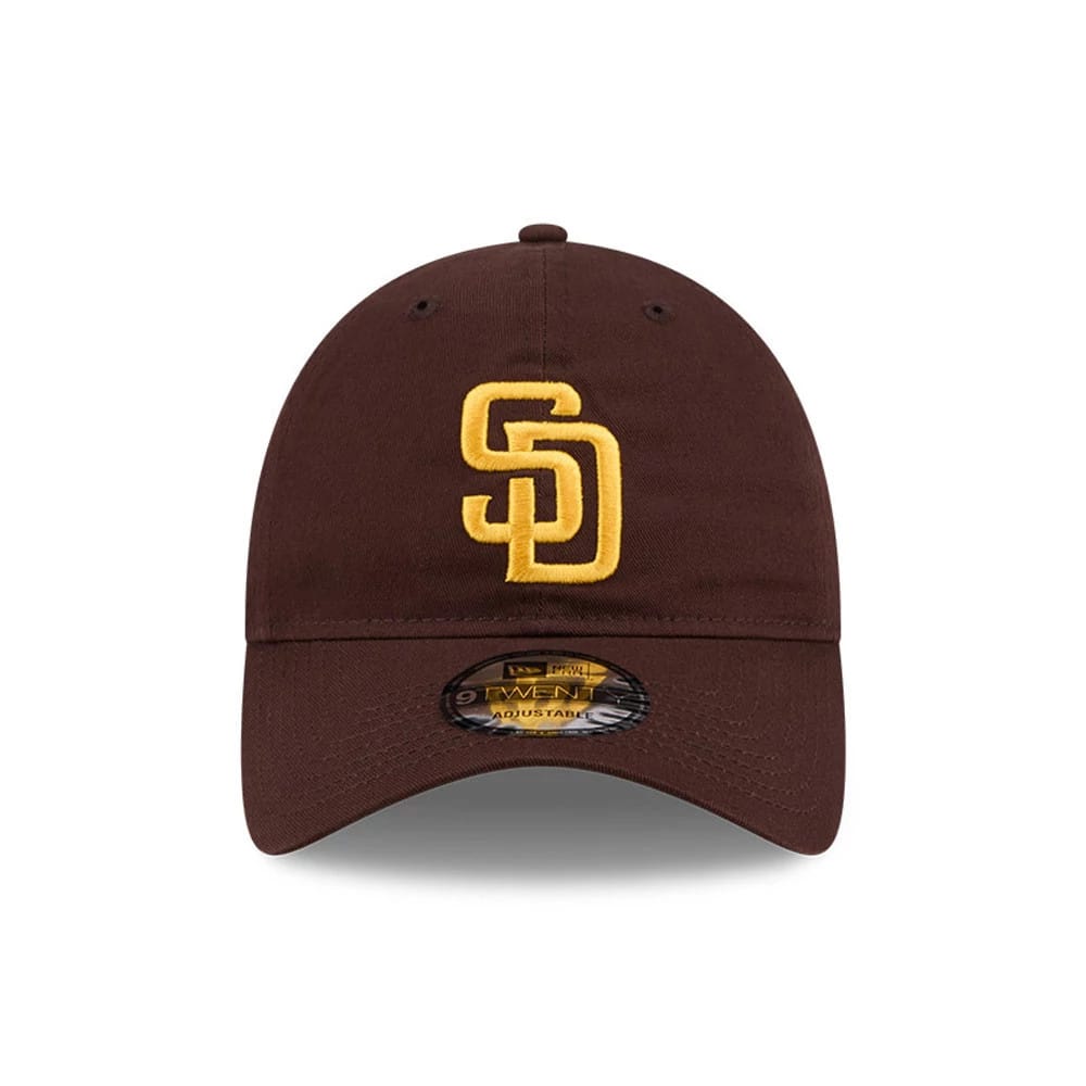 San Diego Padres MLB Colours Dark Brown New Era 9TWENTY Adjustable Cap, front view showing the raised gold SD logo embroidered on the dark brown crown, with a 9TWENTY size sticker on the curved visor.