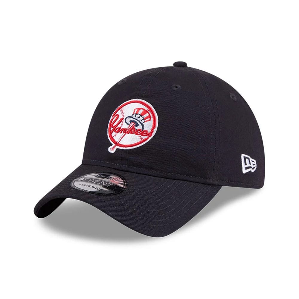 New York Yankees MLB Colours Navy New Era 9TWENTY Adjustable Cap, three-quarter view showing the raised red Yankees logo on the front panel, navy curved visor with a 9TWENTY size sticker, and white New Era flag logo on the left side.