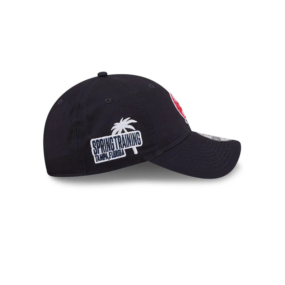 New York Yankees MLB Colours Navy New Era 9TWENTY Adjustable Cap, side view showing white Spring Training Tampa, Florida embroidery with a palm tree graphic on the structured navy crown, curved visor and 9TWENTY size sticker.
