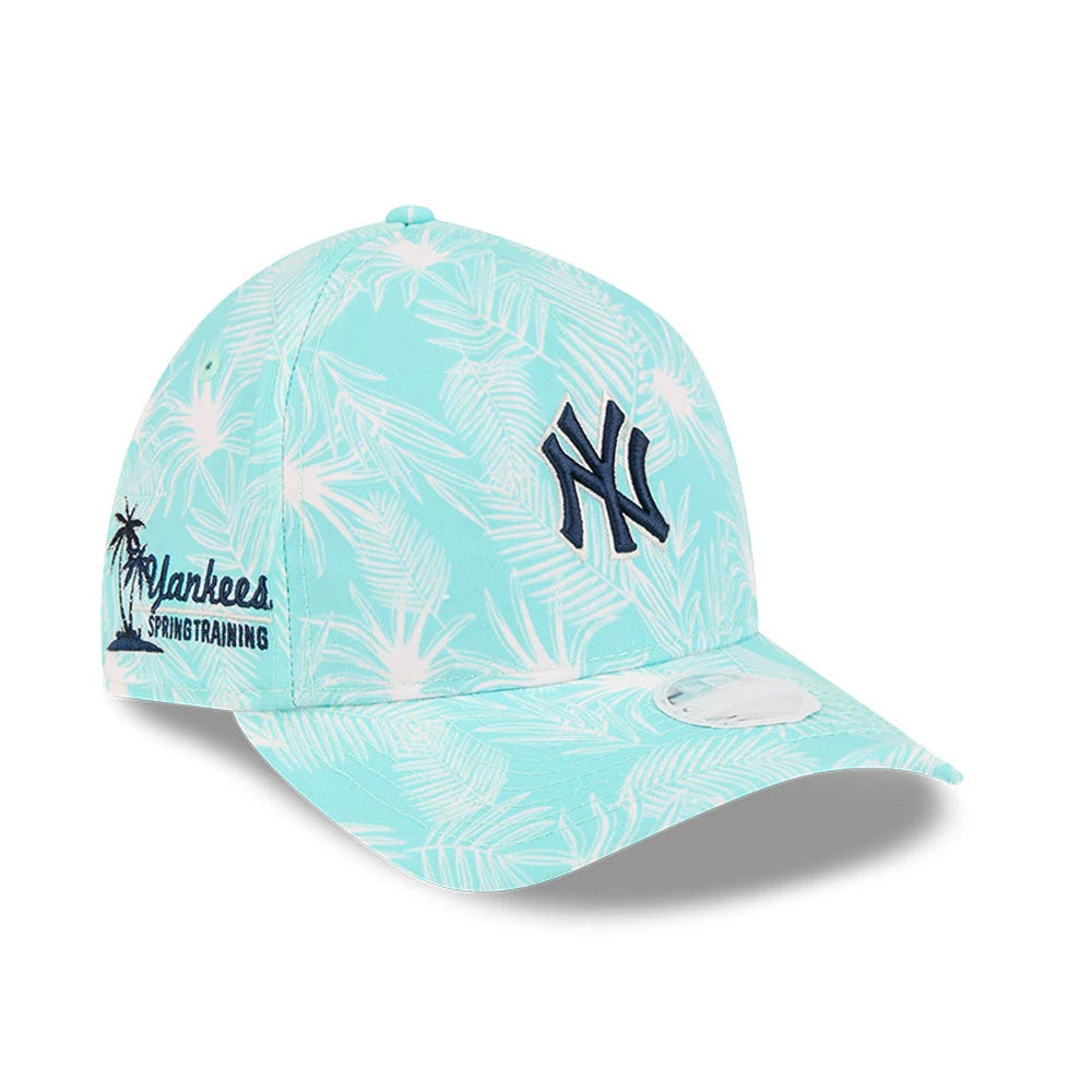New York Yankees Womens MLB Pastel Turquoise New Era 9TWENTY A-Frame Adjustable Cap, three-quarter view showing the raised navy NY logo on the front panel, a palm leaf pattern, and Yankees Spring Training embroidery on the right side.