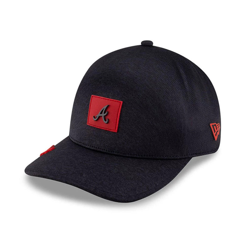 Atlanta Braves MLB Clubhouse Navy New Era 39THIRTY Infinity Stretch Fit Cap, three-quarter view showing a raised red and black embroidered A logo on the front panel, a matching curved visor, and a red New Era flag logo on the left side.