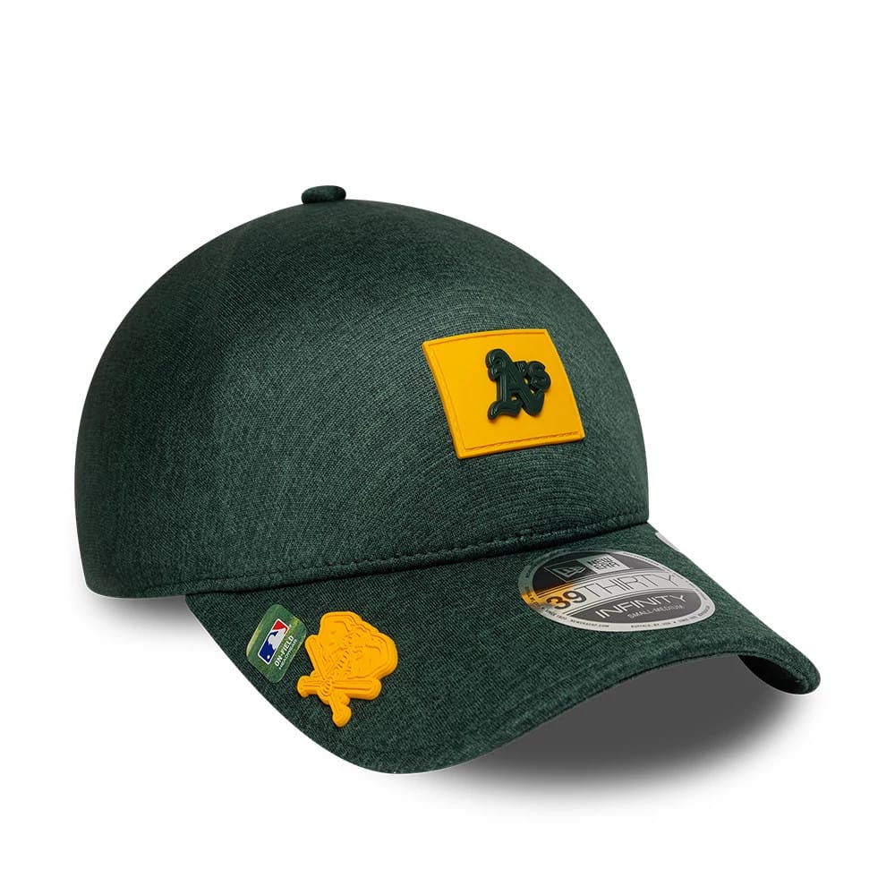 Athletics MLB Clubhouse Dark Green New Era 39THIRTY Infinity Stretch Fit Cap, three-quarter view showing a dark green crown with a yellow logo patch on the front, curved visor with MLB and team badge, and a 39THIRTY size sticker.
