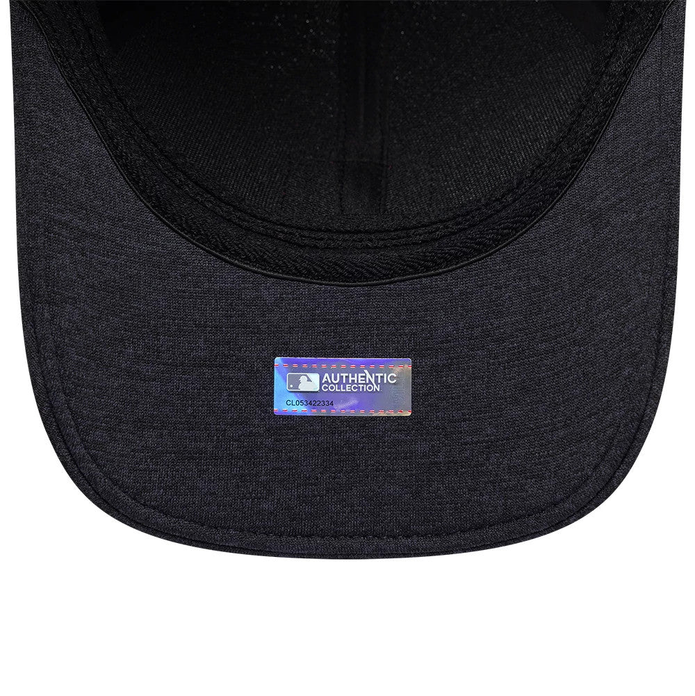 Cleveland Guardians MLB Clubhouse Navy New Era 39THIRTY Infinity Stretch Fit Cap, inside view showing a black sweatband, dark navy undervisor, and MLB Authentic Collection sticker centred beneath the visor.