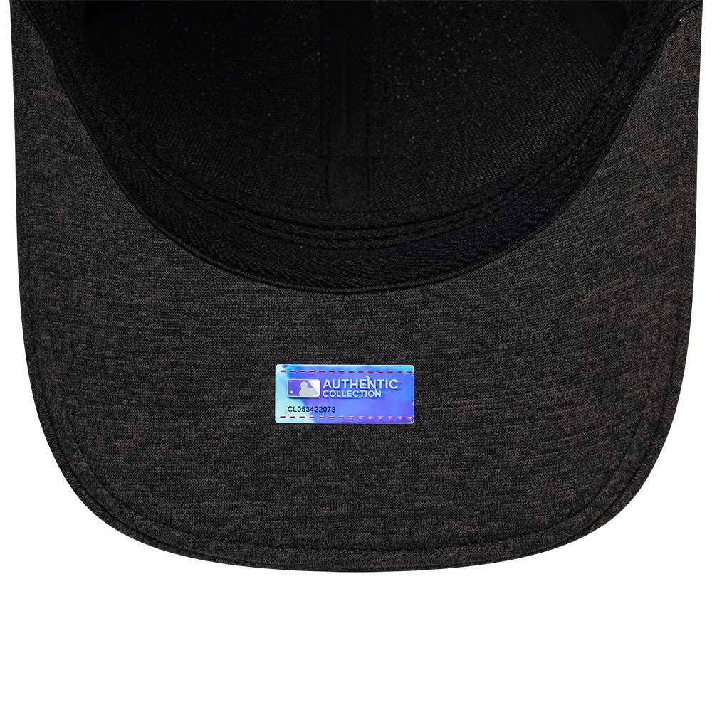 Chicago White Sox MLB Clubhouse Black New Era 39THIRTY Infinity Stretch Fit Cap, inside view showing the black sweatband, taping along the seams, and a holographic Authentic Collection sticker on the black undervisor.
