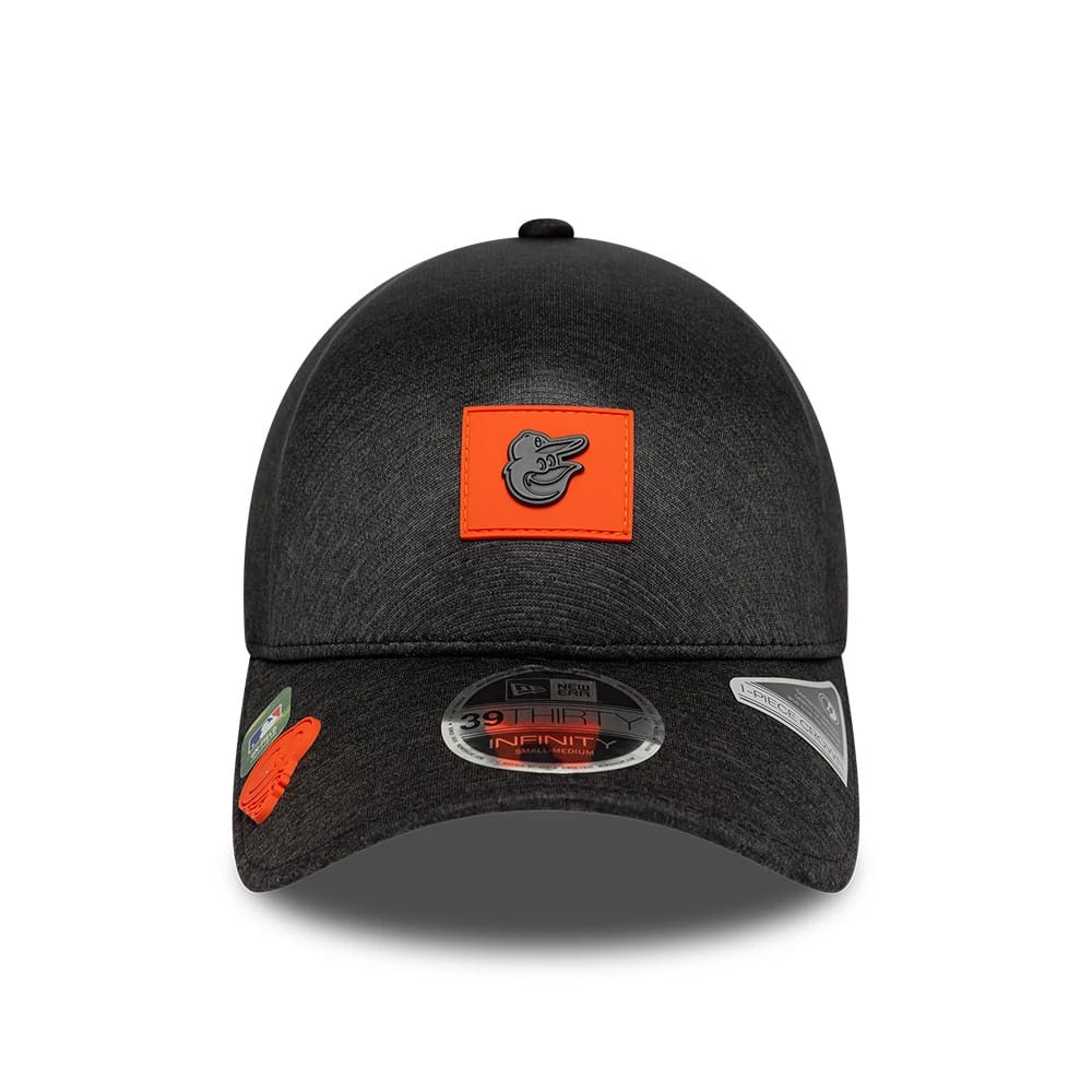 Baltimore Orioles MLB Clubhouse Black New Era 39THIRTY Infinity Stretch Fit Cap, front view showing the grey Orioles logo on an orange patch, black curved visor with 39THIRTY size sticker, and a structured crown.