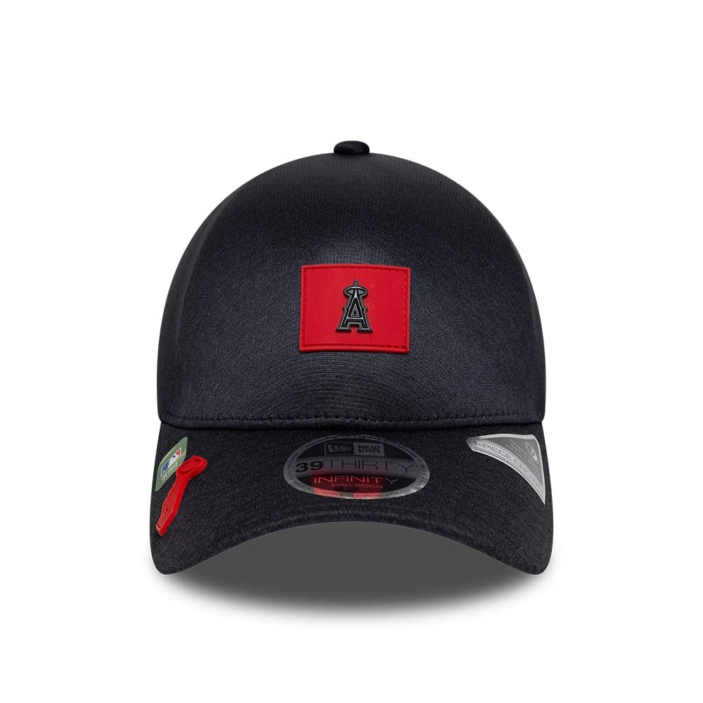 LA Angels MLB Clubhouse Black New Era 39THIRTY Infinity Stretch Fit Cap, front view showing a black A logo on a red rectangular patch on the structured black crown, with a 39THIRTY size sticker on the curved visor.