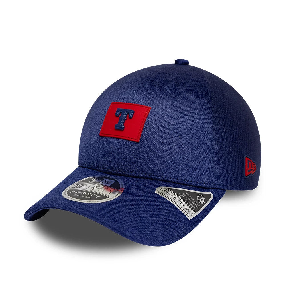 Texas Rangers MLB Clubhouse Dark Blue New Era 39THIRTY Infinity Stretch Fit Cap, three-quarter view showing the raised T logo on a red patch on the front panel, dark blue curved visor with size sticker, and New Era flag logo on the left side.
