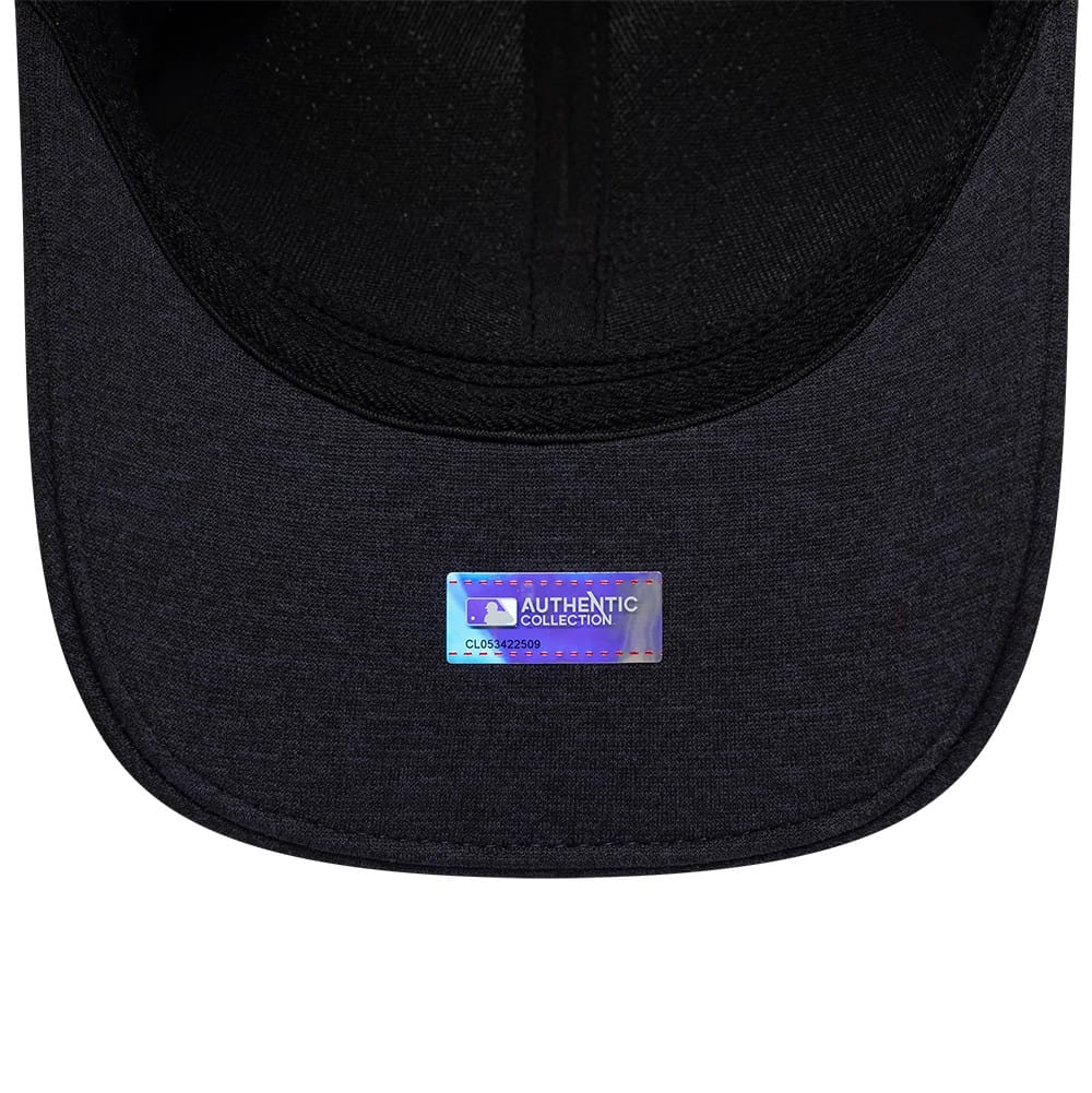 Washington Nationals MLB Clubhouse Black New Era 39THIRTY Infinity Stretch Fit Cap, inside view showing the black undervisor with an Authentic Collection sticker and black taping along the seams.