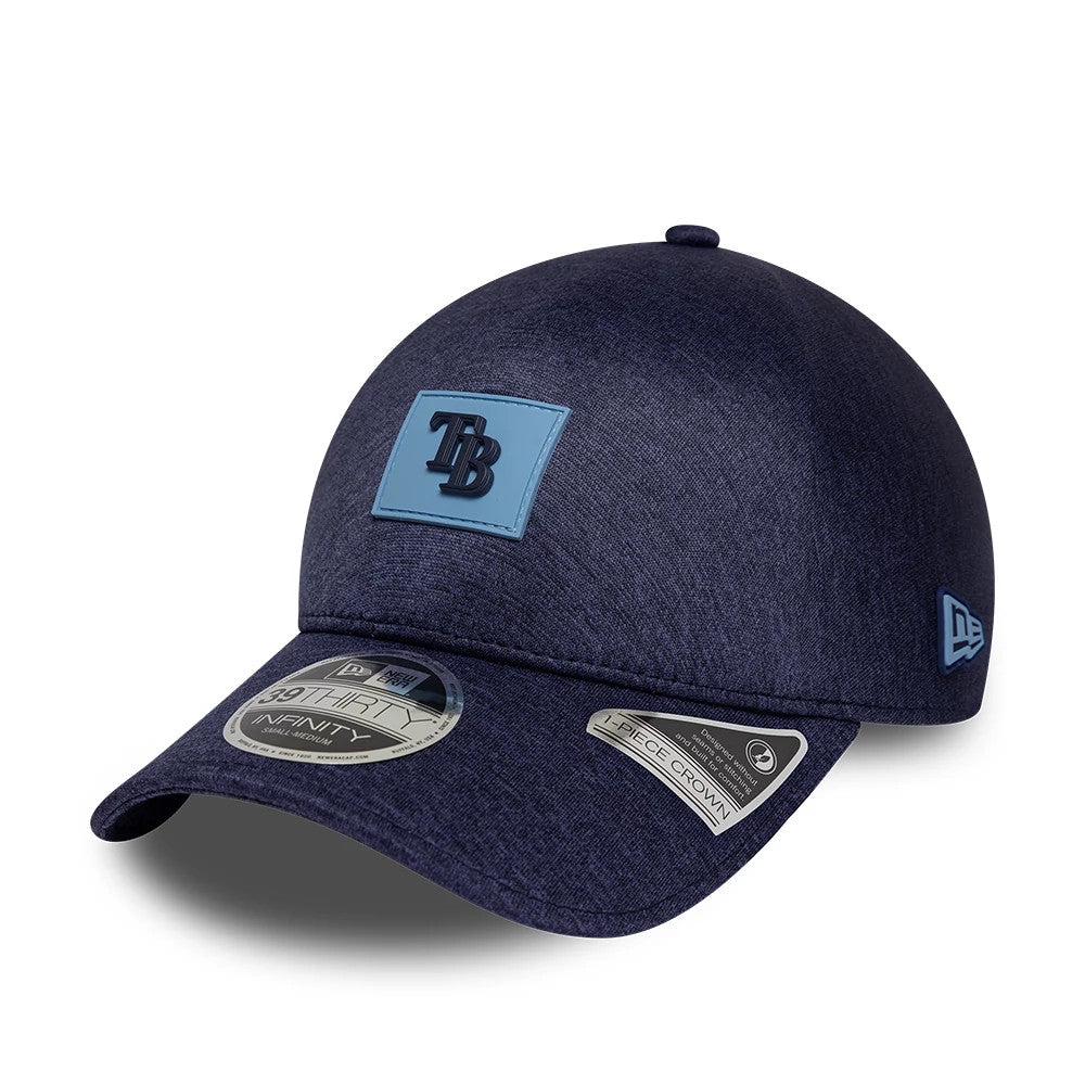 Tampa Bay Rays MLB Clubhouse Navy New Era 39THIRTY Infinity Stretch Fit Cap, front view showing a blue TB logo patch on the front panel, a pre-curved navy visor and grey 39THIRTY size sticker on the top.