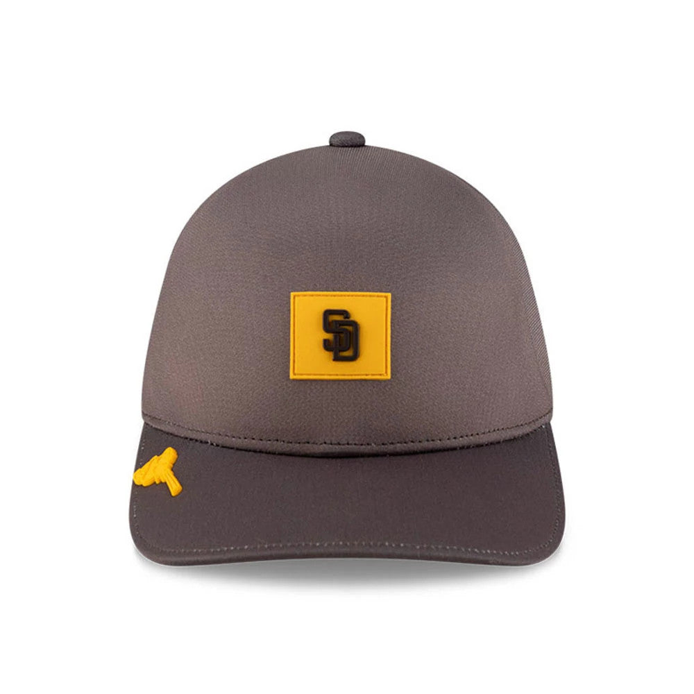 San Diego Padres MLB Clubhouse Dark Brown New Era 39THIRTY Infinity Stretch Fit Cap, front view showing a brown flat-embroidered SD logo on a yellow patch on the structured crown, with a small yellow logo on the left side of the visor.