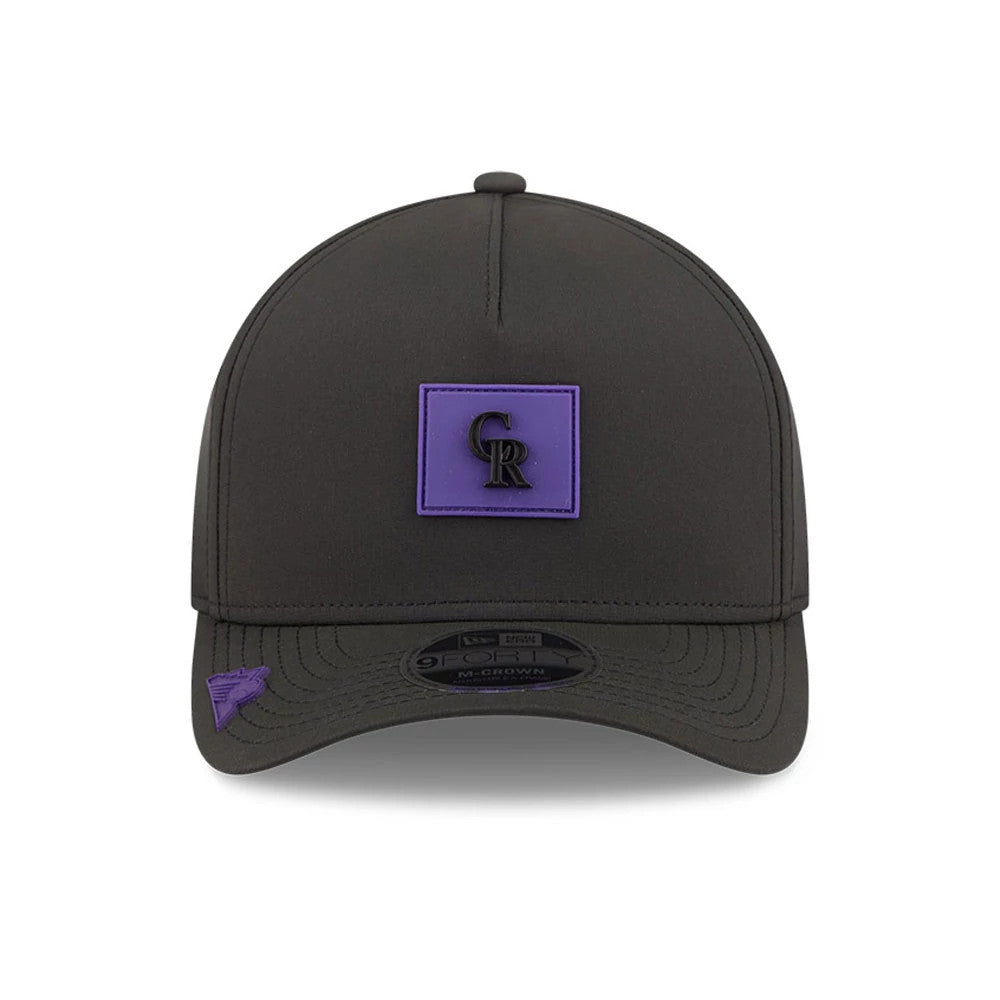 Colorado Rockies MLB Clubhouse Black New Era 9FORTY M-Crown A-Frame Adjustable Cap, front view showing a raised black CR logo on a purple patch on the front panel, black curved visor, and a black 9FORTY size sticker.
