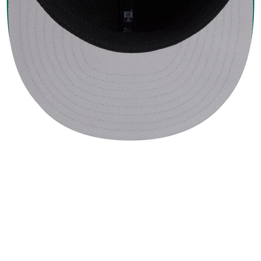Athletics MLB Clubhouse Dark Green New Era 59FIFTY Fitted Cap, inside view showing the black sweatband, New Era branded taping along the seams, and a grey undervisor beneath the structured flat visor.