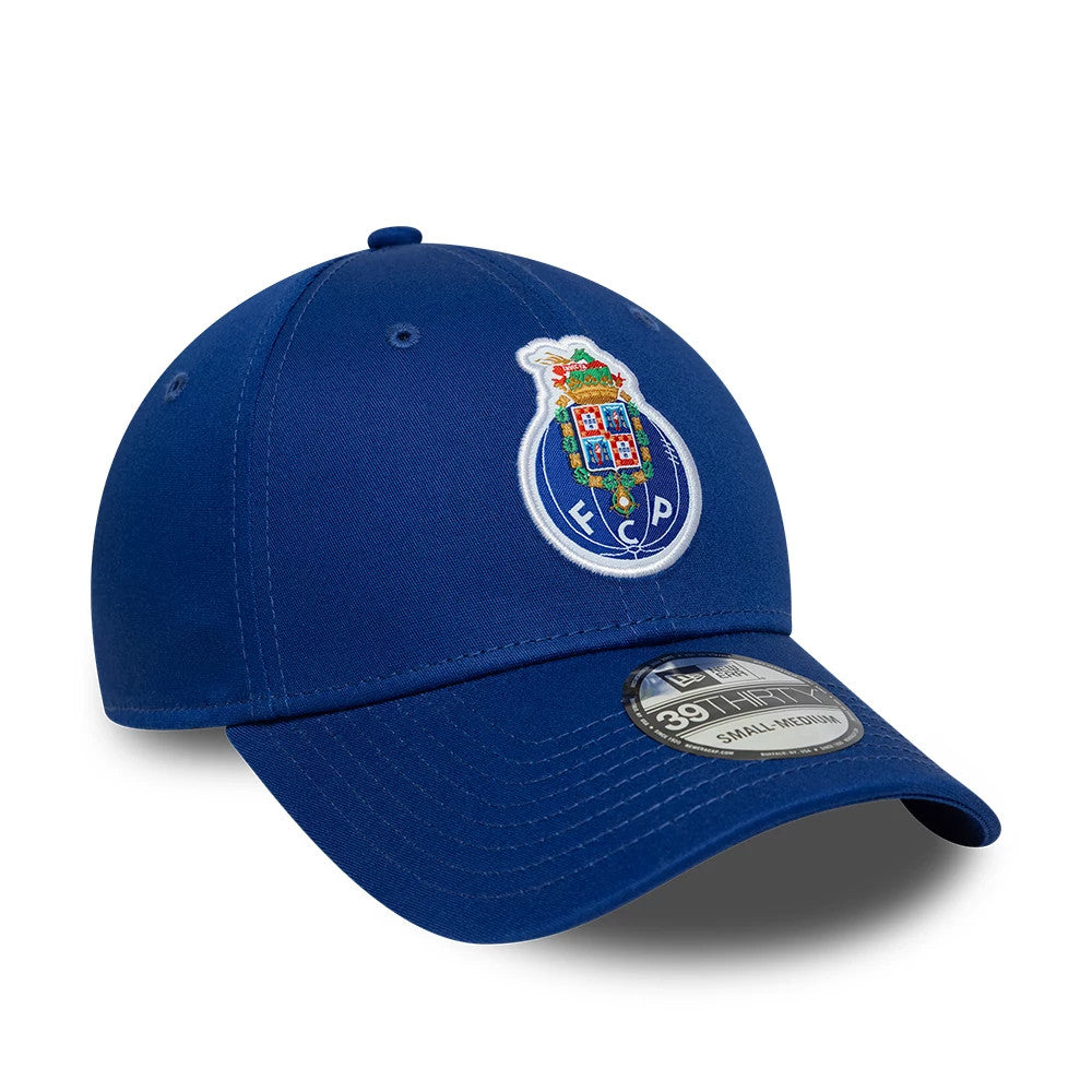 FC Porto Core Blue New Era 39THIRTY Stretch Fit Cap, three-quarter view showing the multicoloured embroidered club crest on the front panel, with a curved blue visor and a 39THIRTY size sticker on the top.