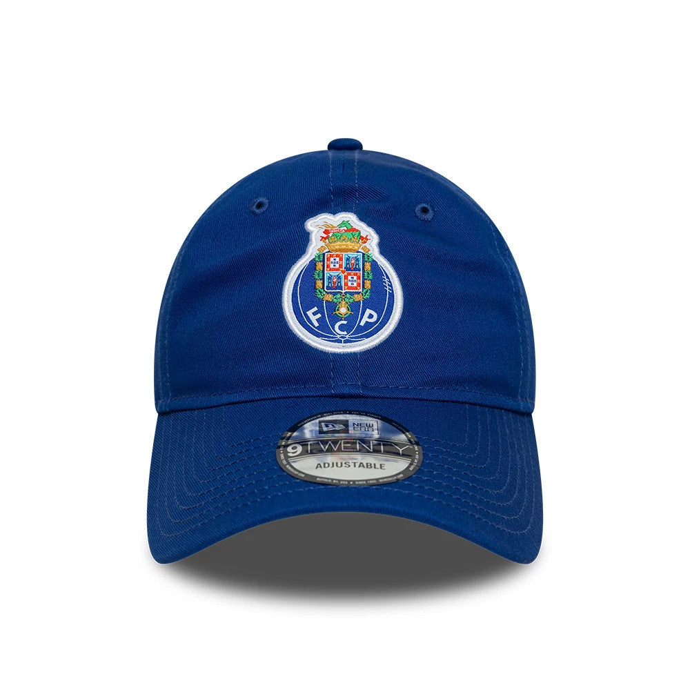 FC Porto Core Blue New Era 9TWENTY Cap, front view showing the colourful embroidered club crest on the front panel, curved blue visor with 9TWENTY size sticker, and matching blue top button and eyelets.