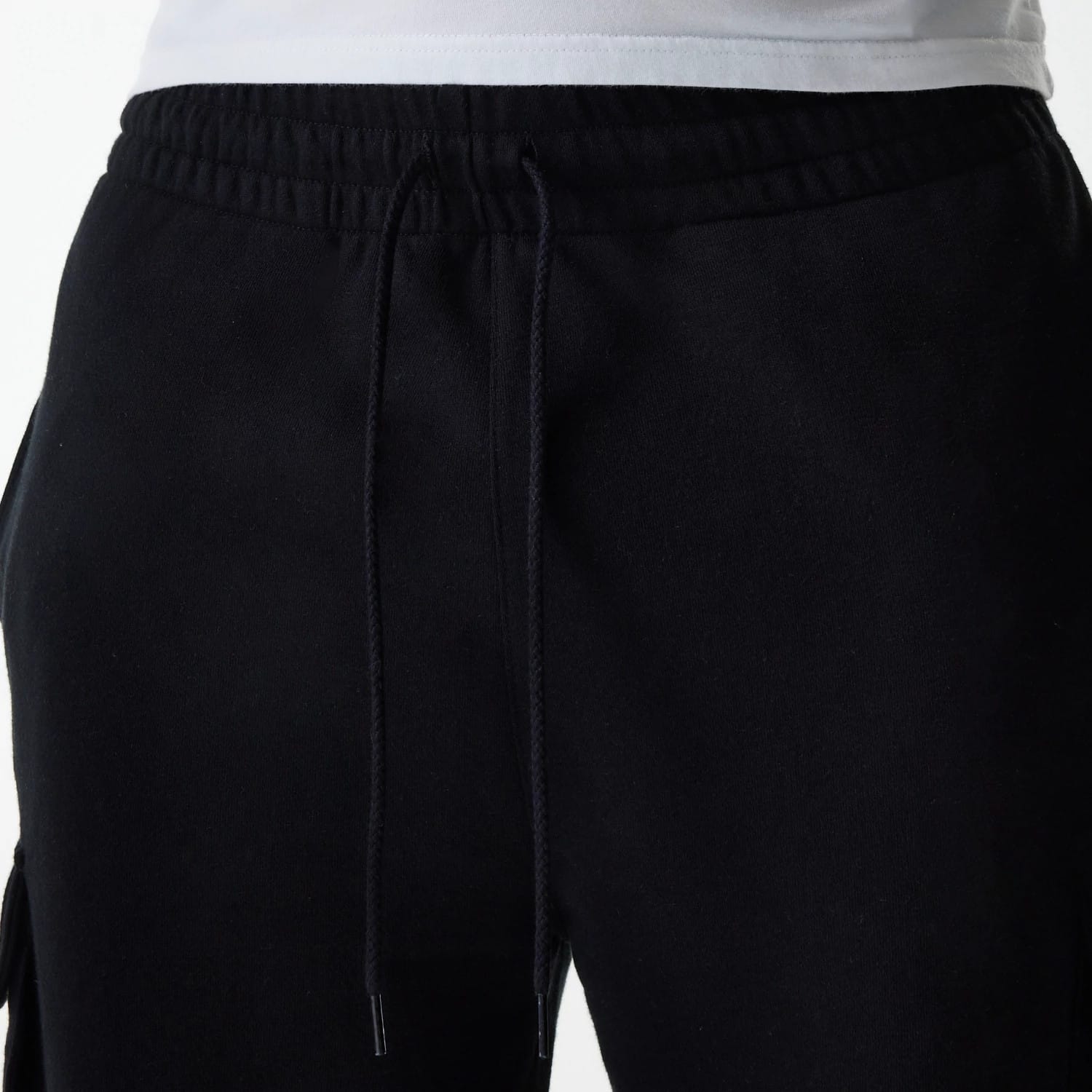The model is wearing this New Era Cargo Joggers in black. 3