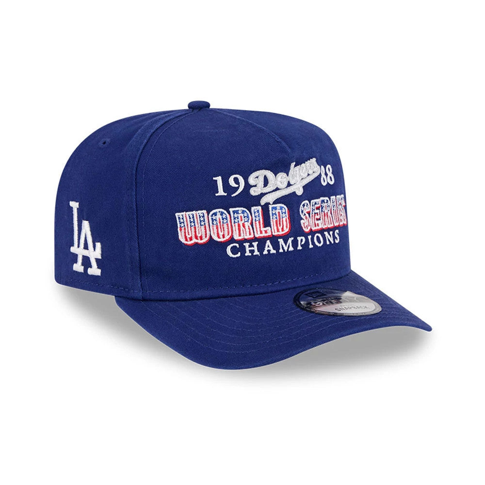 LA Dodgers MLB Historic Navy New Era 9FIFTY A-Frame Snapback Adjustable Cap, three-quarter view showing white embroidered 1988 Dodgers World Series Champions on the front panel, with a white LA logo on the left side.