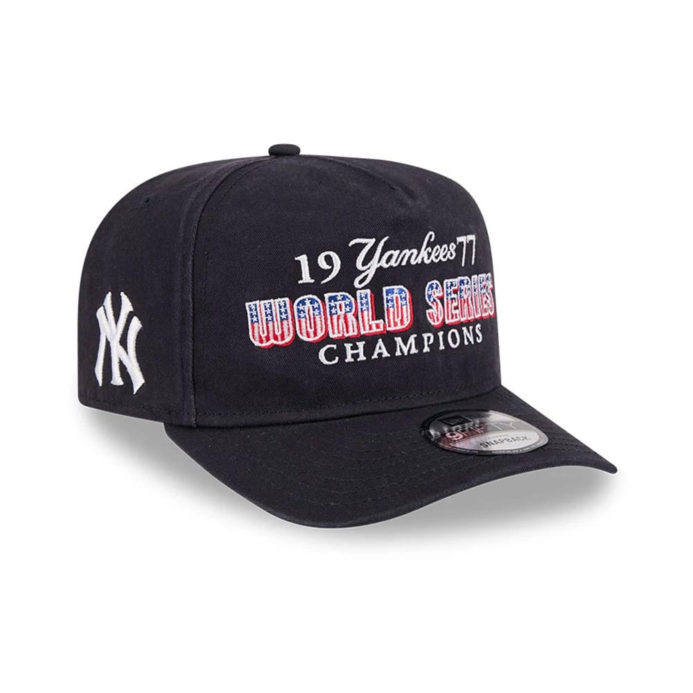 New York Yankees MLB Historic Navy New Era 9FIFTY A-Frame Snapback Adjustable Cap, three-quarter view showing the red, white, and blue embroidered World Series Champions lettering on the front panel, a flat black visor.