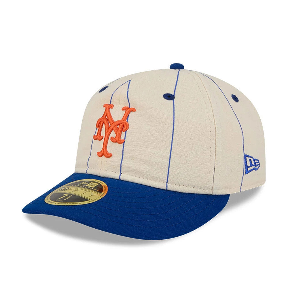 New York Mets MLB Linen Cream Retro Crown New Era 59FIFTY Fitted Cap, three-quarter view showing the raised orange embroidered NY logo on the front panel, blue visor with gold 59FIFTY size sticker, and the New Era flag logo on the left side.