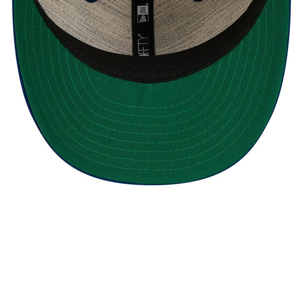 New York Mets MLB Linen Cream Retro Crown New Era 59FIFTY Fitted Cap, inside view showing the dark green undervisor with stitching, black internal taping with 59FIFTY branding, and a neutral-coloured sweatband.