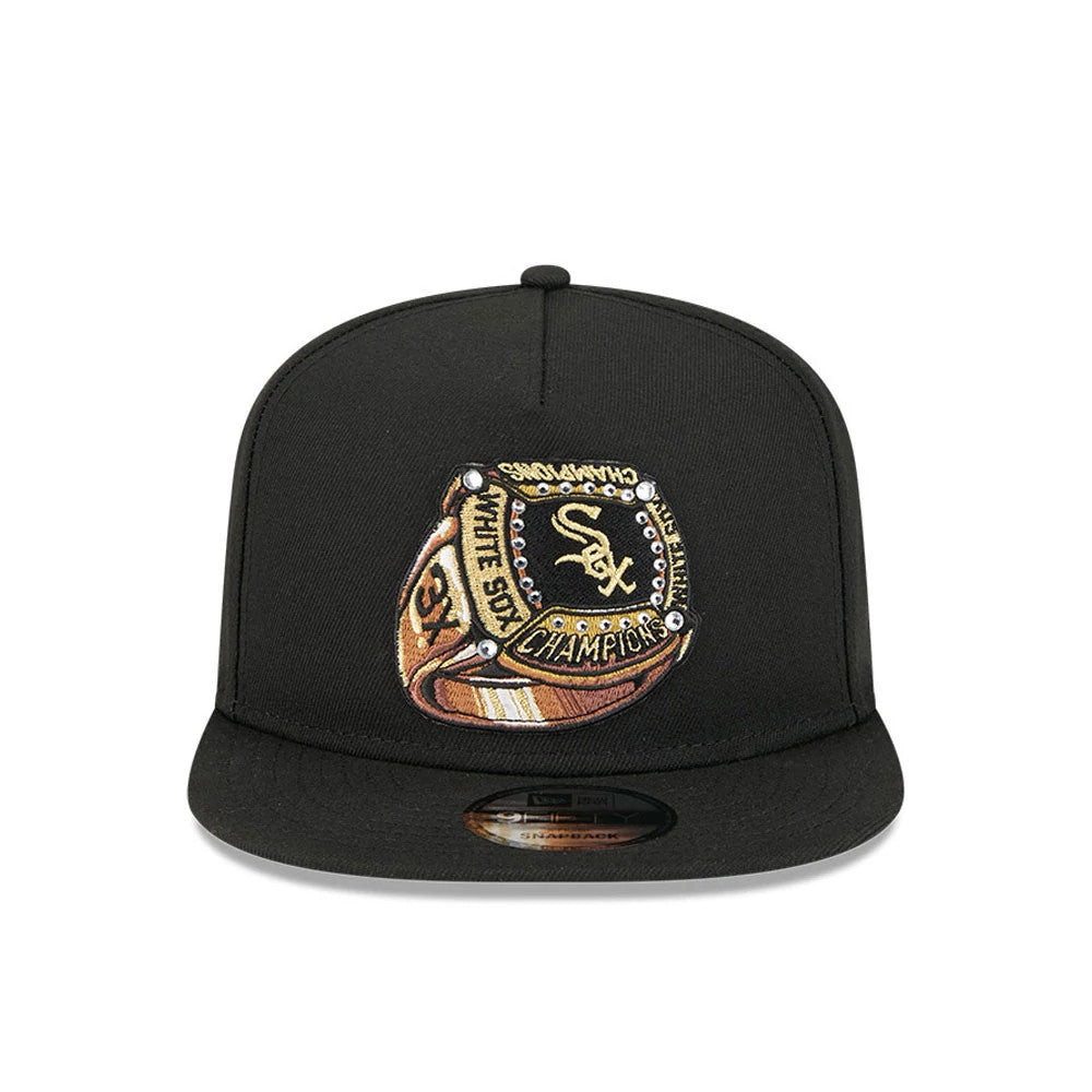 Chicago White Sox MLB Ring Black New Era 9FIFTY A-Frame Snapback Adjustable Cap, front view with a raised embroidered championship ring graphic on the front panel and a black flat visor with a 9FIFTY size sticker.