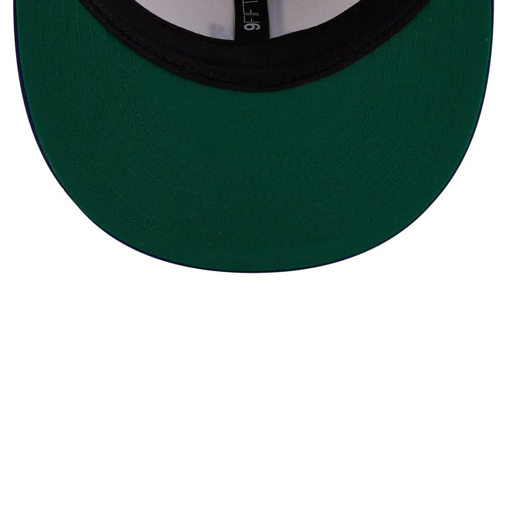 LA Dodgers MLB Localized White New Era 9FIFTY Snapback Adjustable Cap, inside view showing a green undervisor, a black sweatband, and black taping with 9FIFTY branding in white text.