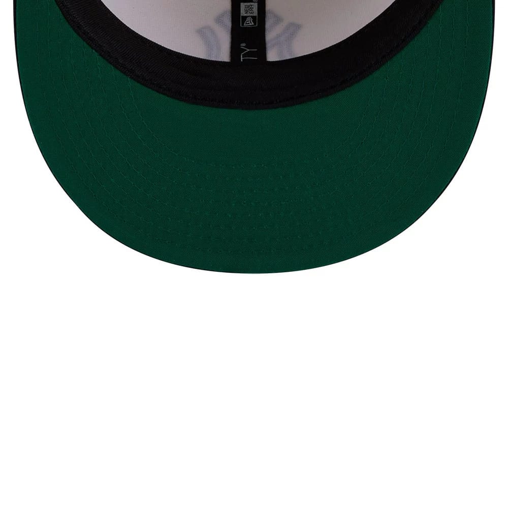 New York Yankees MLB Localized White New Era 9FIFTY Snapback Adjustable Cap, inside view showing the green undervisor, black sweatband, white interior panels with stitching, and inner tag detailing.
