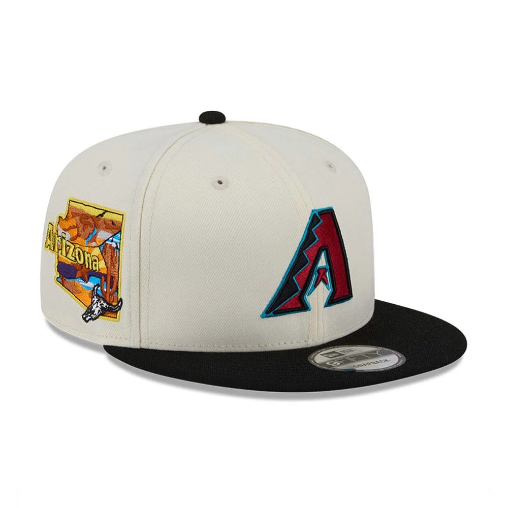 Arizona Diamondbacks MLB Localized White New Era 9FIFTY Snapback Adjustable Cap, three-quarter view with burgundy embroidered A logo, Arizona graphic on the side, and a black flat visor with a 9FIFTY size sticker.