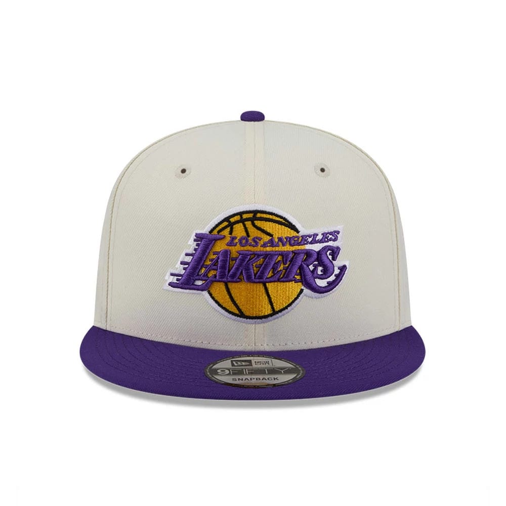LA Lakers NBA Localized White New Era 9FIFTY Snapback Adjustable Cap, front view showing purple and gold raised embroidered Lakers logo on the white front panel, with a flat purple visor and a 9FIFTY size sticker.