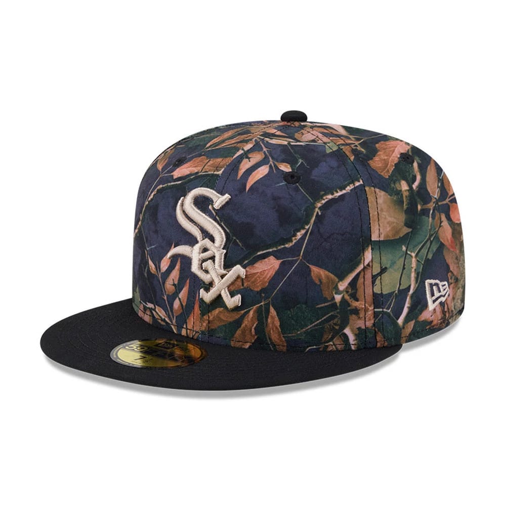 Chicago White Sox MLB Leaves Black New Era 59FIFTY Fitted Cap, three-quarter view showing raised white front logo embroidery on a multicoloured leaf-patterned crown, with a black visor and a gold 59FIFTY size sticker.