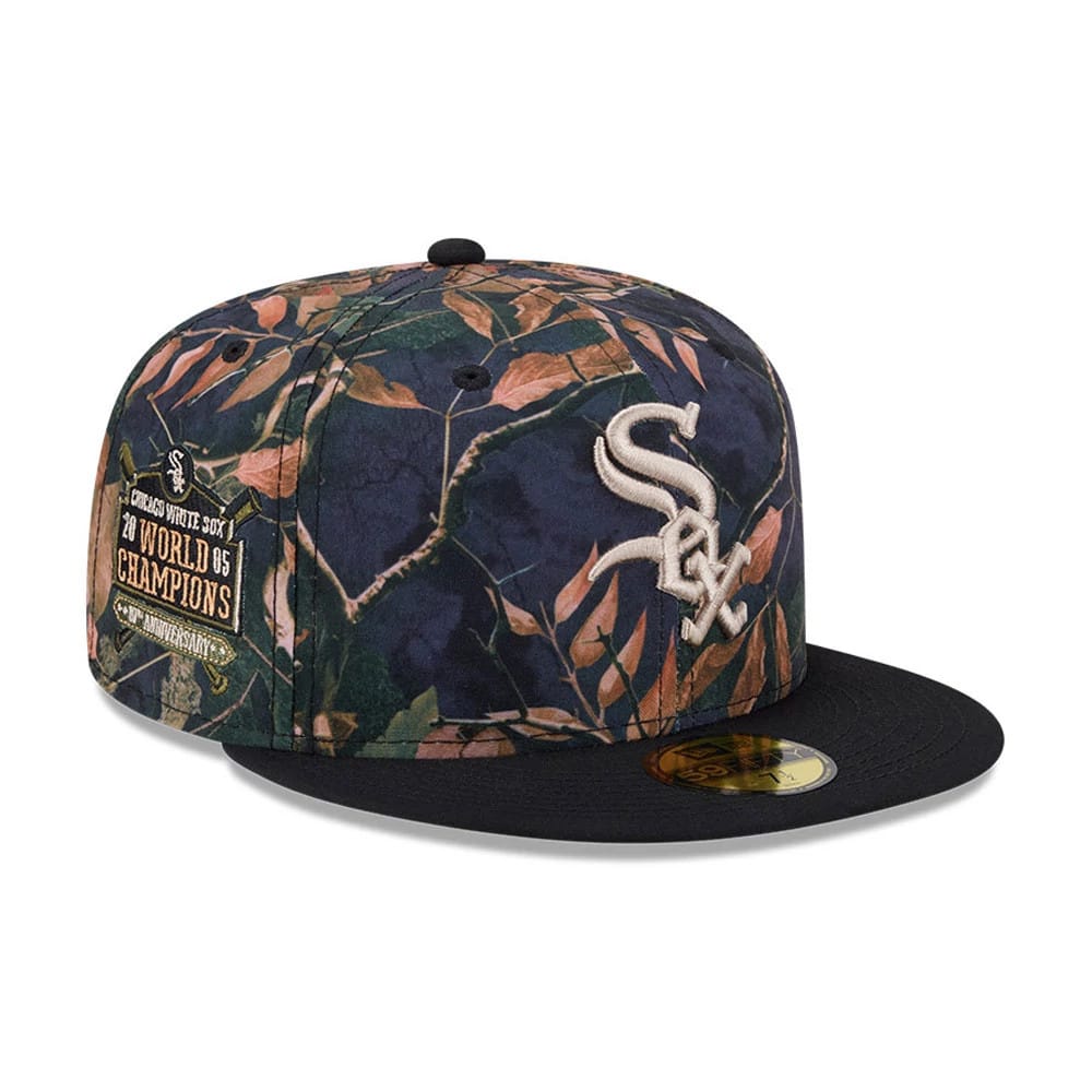 Chicago White Sox MLB Leaves Black New Era 59FIFTY Fitted Cap, three-quarter view showing the beige embroidered team logo on the front panel, detailed leaf pattern, and gold 59FIFTY size sticker on the flat black visor.