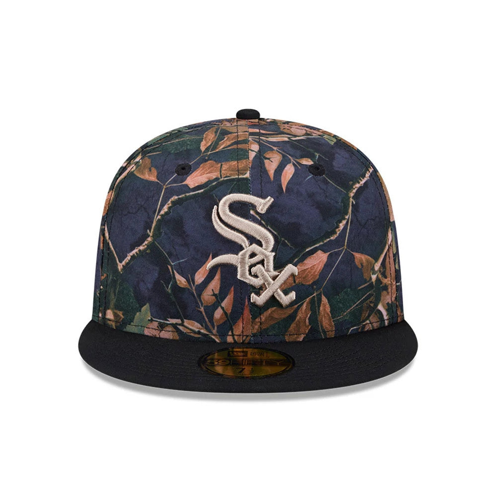 Chicago White Sox MLB Leaves Black New Era 59FIFTY Fitted Cap, front view showing the raised embroidered white Sox logo on the multicoloured leaves pattern crown, with a black flat visor and gold 59FIFTY size sticker.