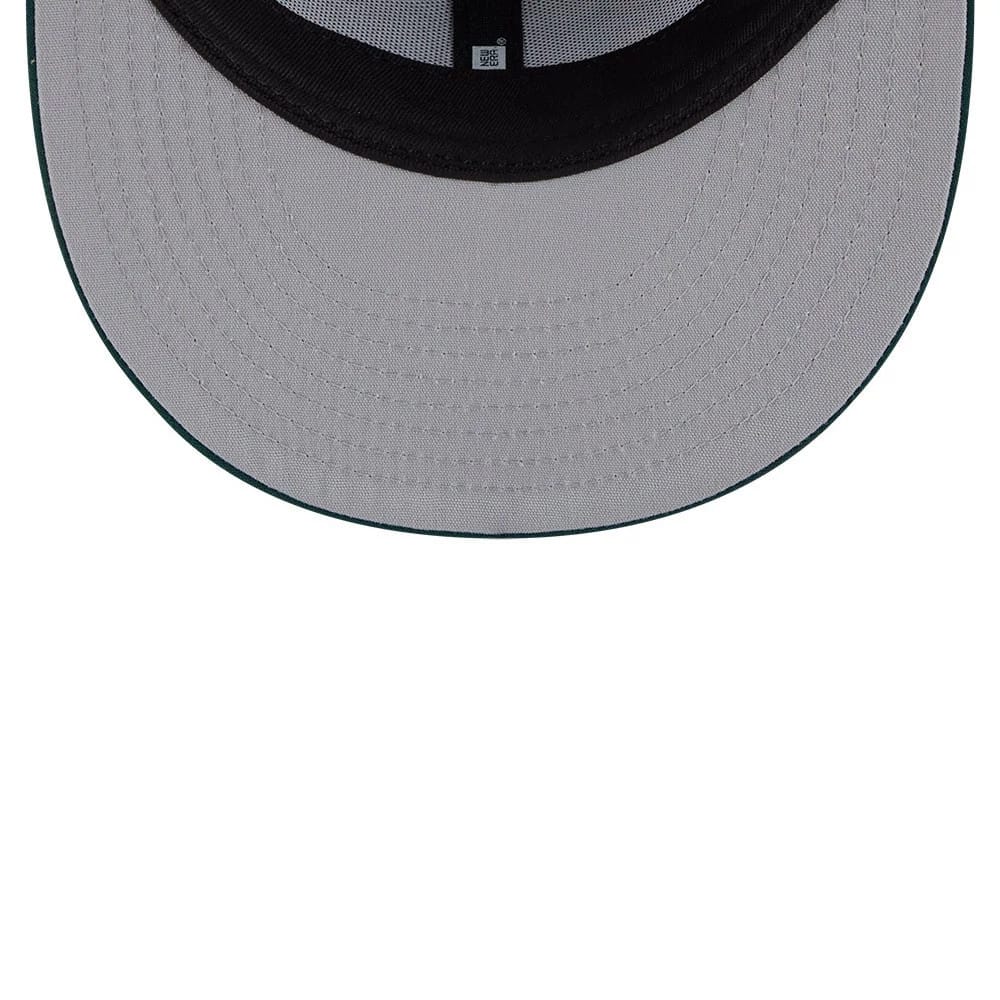 Athletics MLB Leaves Dark Green New Era 59FIFTY Fitted Cap, inside view showing the grey undervisor, black sweatband and branded taping, with a detailed close-up of the cap's structured interior lining.