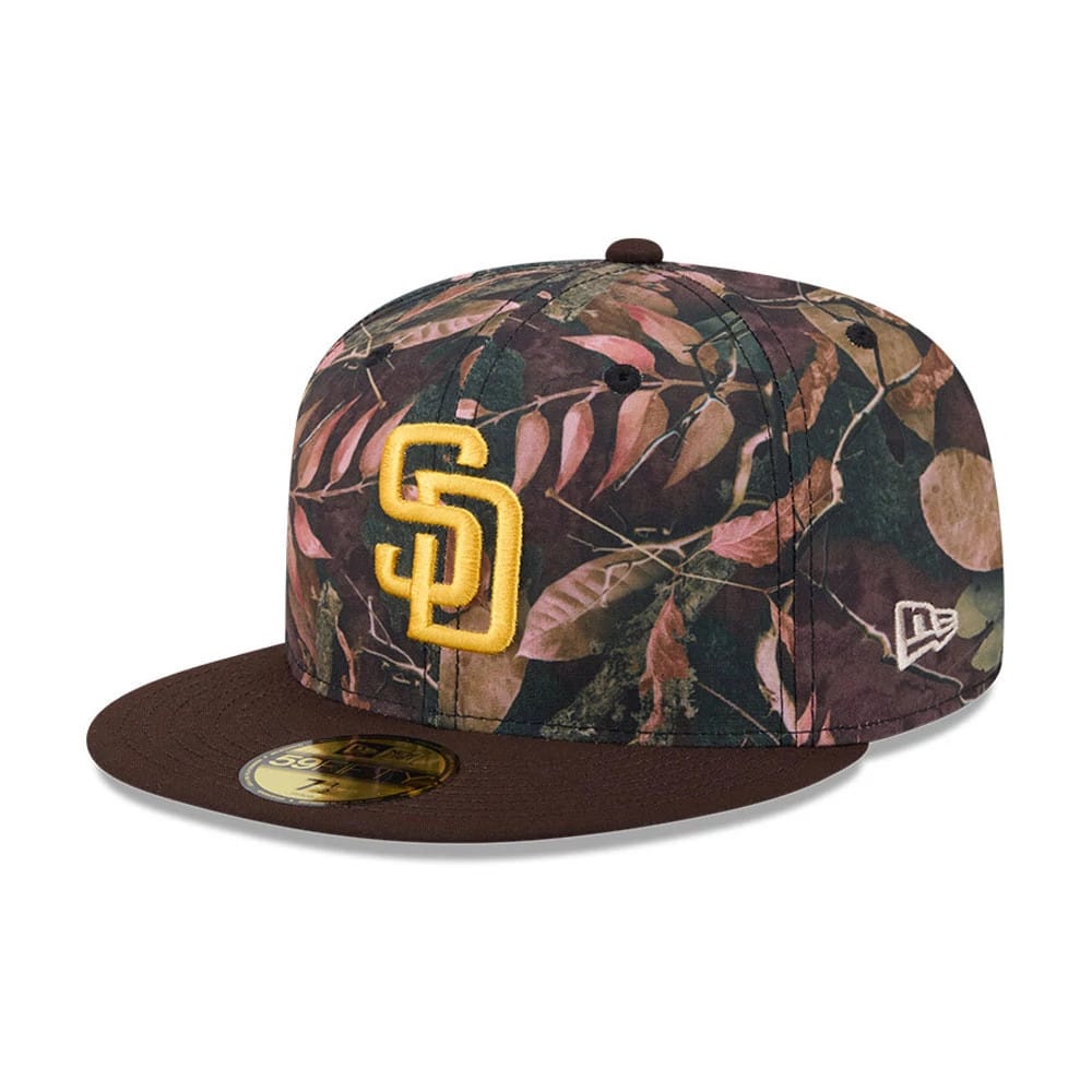 San Diego Padres MLB Leaves Dark Brown New Era 59FIFTY Fitted Cap, three-quarter view showing the raised gold embroidered SD logo on the front panel, with a flat dark brown visor and gold 59FIFTY size sticker.