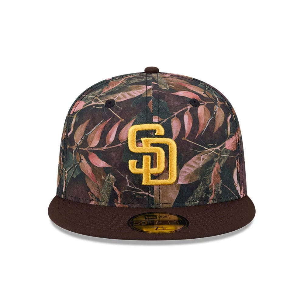San Diego Padres MLB Leaves Dark Brown New Era 59FIFTY Fitted Cap, front view showing the gold embroidered SD logo on a lush leaves-patterned crown, with a dark brown visor and gold 59FIFTY size sticker.