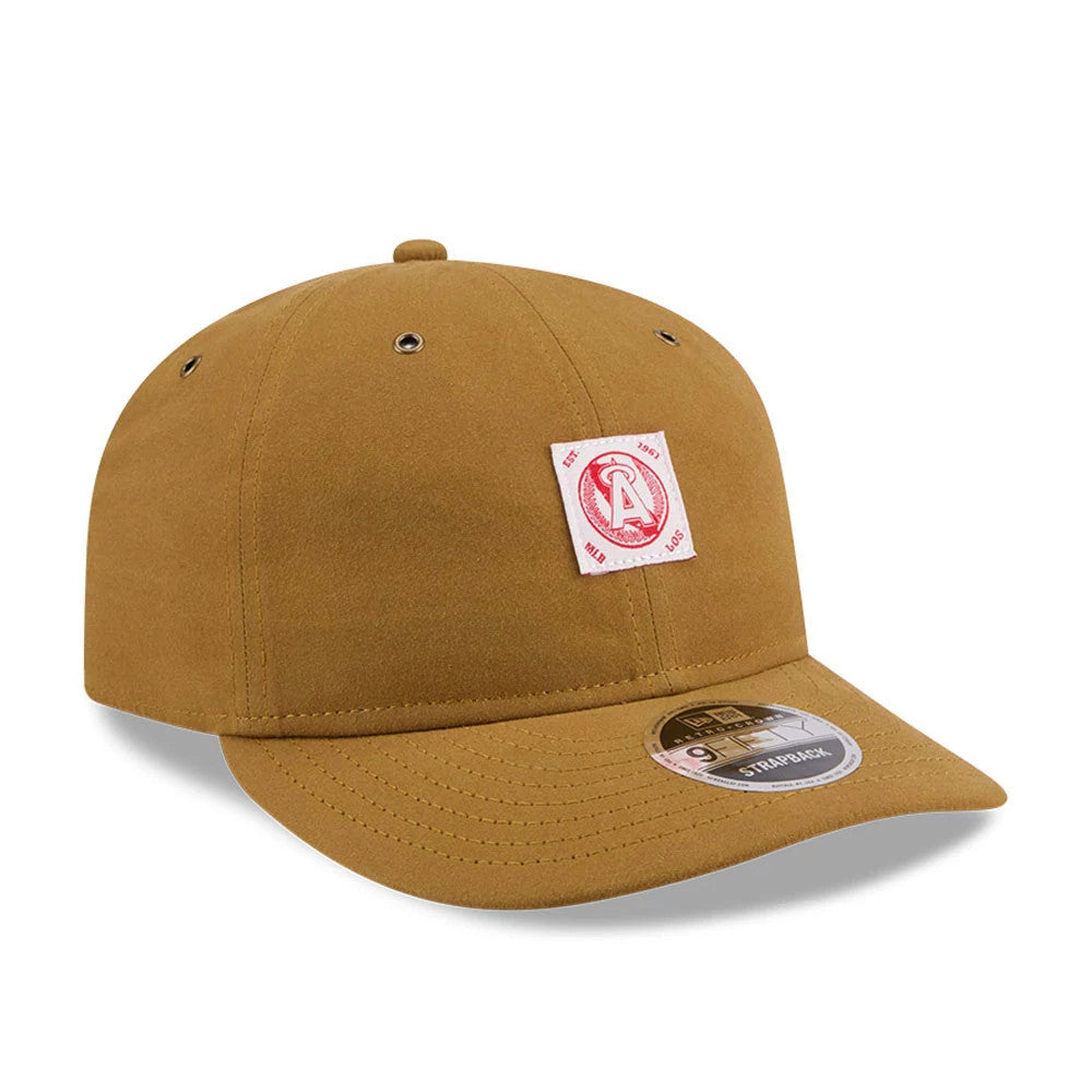 LA Angels MLB Brushed Dark Beige Retro Crown New Era 9FIFTY Adjustable Cap, three-quarter view showing a red and white patch logo on the front panel, a curved visor with a 920 size sticker, and eyelets on the structured crown.