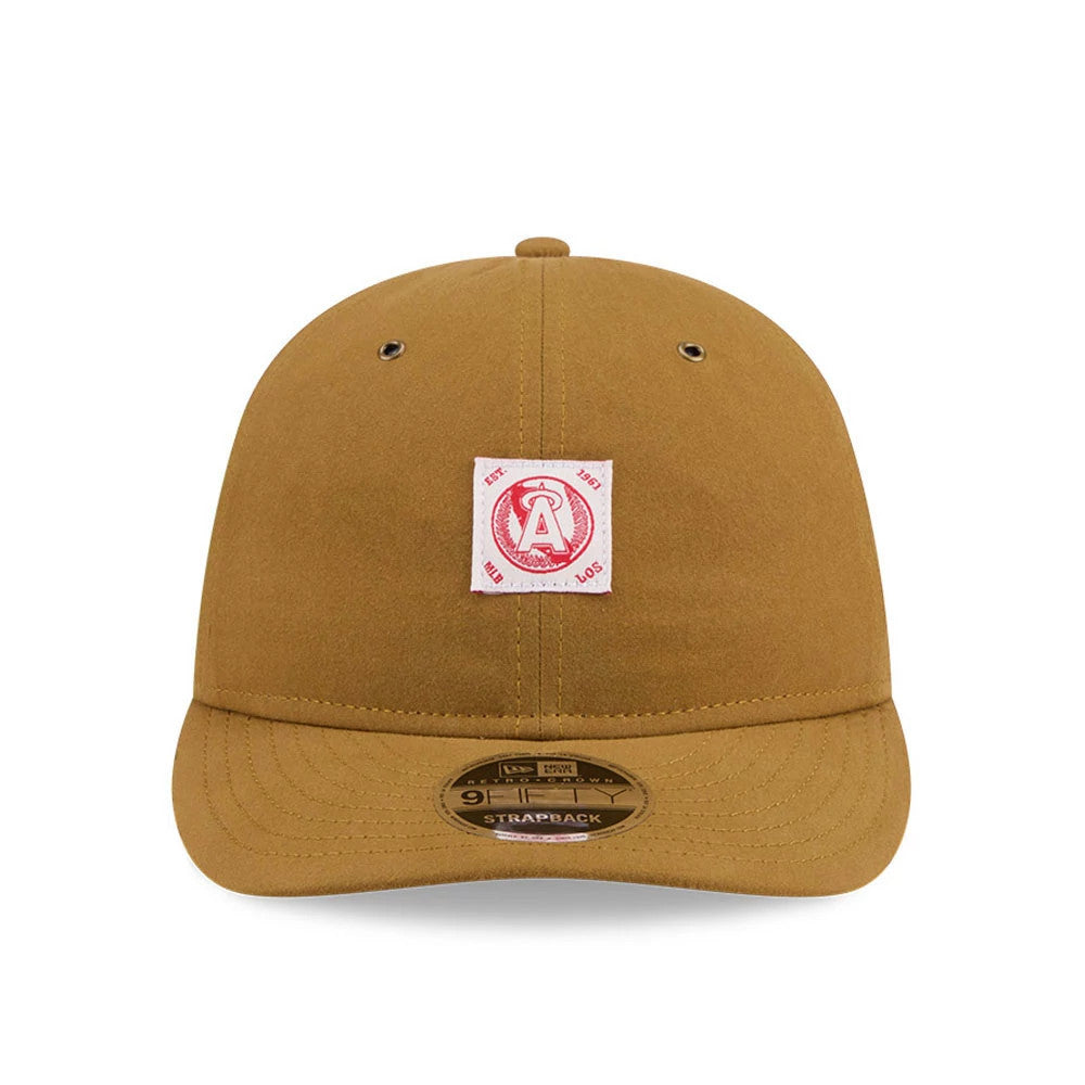 LA Angels MLB Brushed Dark Beige Retro Crown New Era 9FIFTY Adjustable Cap, front view showing a red embroidered A logo patch on the front panel, curved visor with a gold 9FIFTY size sticker, and matching top button and eyelets.