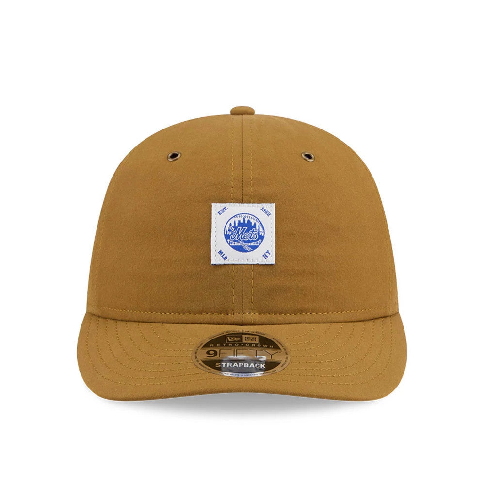 New York Mets MLB Brushed Dark Beige Retro Crown New Era 9FIFTY Adjustable Cap, front view showing a blue and white embroidered square logo patch on the front panel, brown curved visor and the 9FIFTY size sticker.