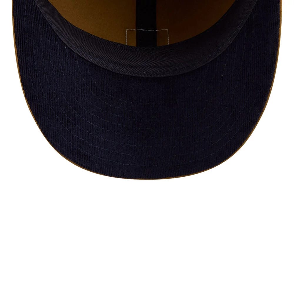 New York Yankees MLB Brushed Dark Beige Retro Crown New Era 9FIFTY Adjustable Cap, inside view showing a black sweatband, dark undervisor, and brown interior with a single black strip of taping.