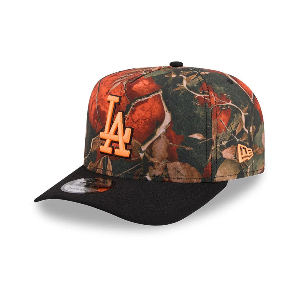 LA Dodgers MLB Leaves Bright Orange New Era 9FIFTY A-Frame Snapback Adjustable Cap, three-quarter view showing raised bright orange LA logo embroidery on a leaf-patterned crown, with a black visor and 9FIFTY size sticker.