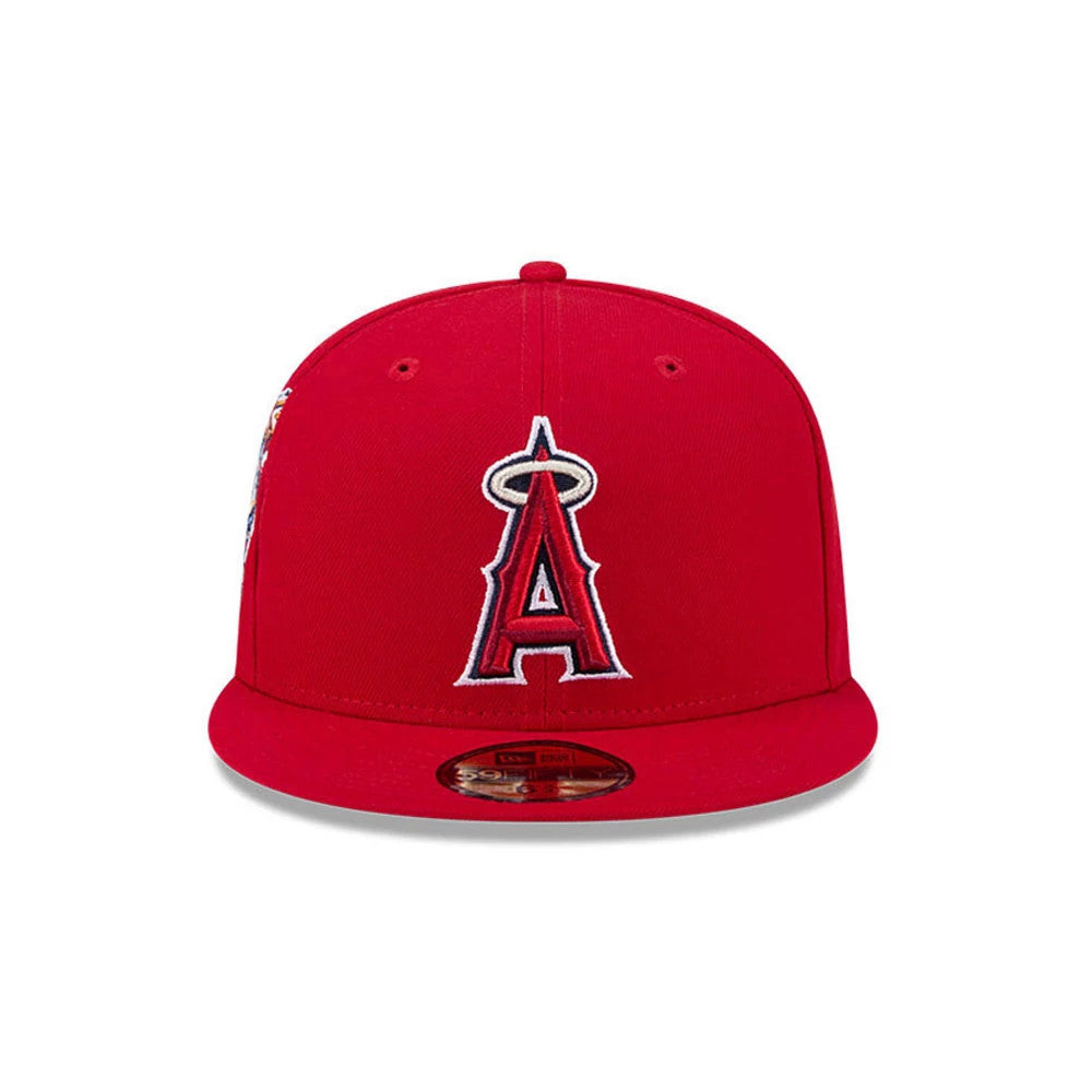 LA Angels MLB Hidden Hit Red New Era 59FIFTY Fitted Cap, front view showing the raised red and white embroidered Angels A logo on the structured red crown, with a gold 59FIFTY size sticker on the flat red visor.