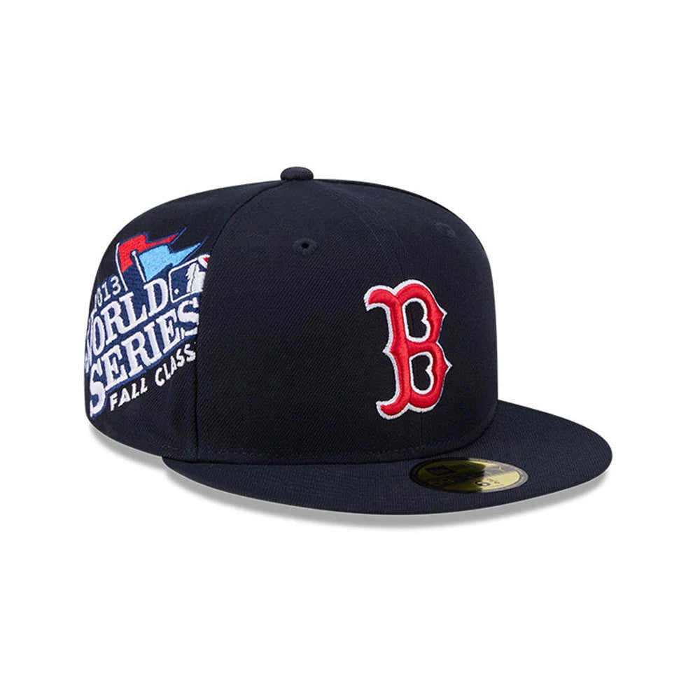 Boston Red Sox MLB Hidden Hit Navy New Era 59FIFTY Fitted Cap, side view showing the red embroidered B on the front panel, a 2013 World Series Fall Classic graphic on the side, and a gold 59FIFTY size sticker on the navy visor.