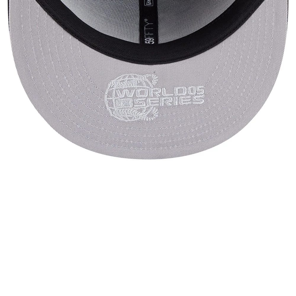 Chicago White Sox MLB Hidden Hit Black New Era 59FIFTY Fitted Cap, inside view showing the grey undervisor with white embroidered World Series graphic, black sweatband and New Era branding on the taping above.