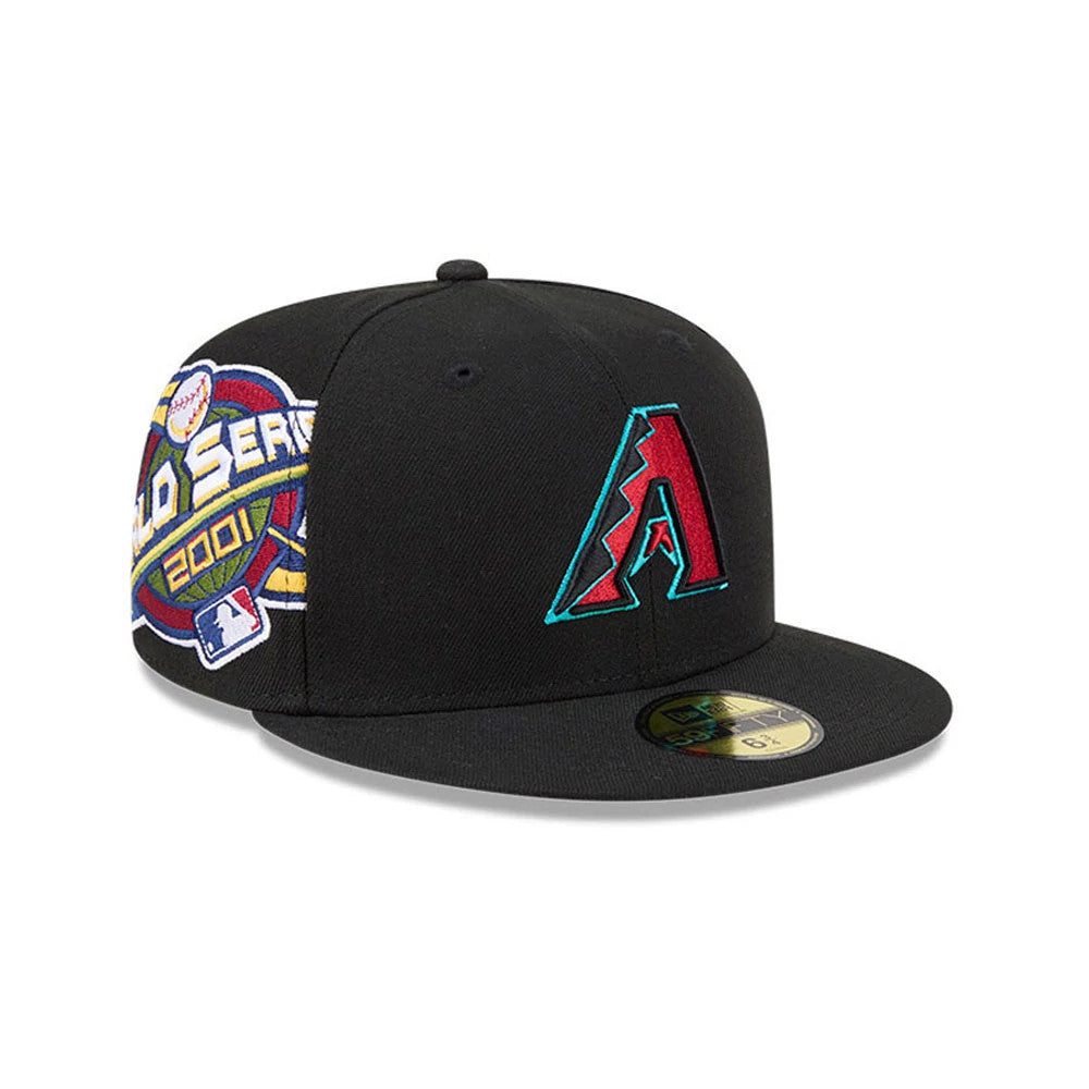 Arizona Diamondbacks MLB Hidden Hit Black New Era 59FIFTY Fitted Cap, three-quarter view showing the raised red and teal A logo on the front panel, with a 2001 World Series patch on the left side and a gold size sticker on the flat black visor.