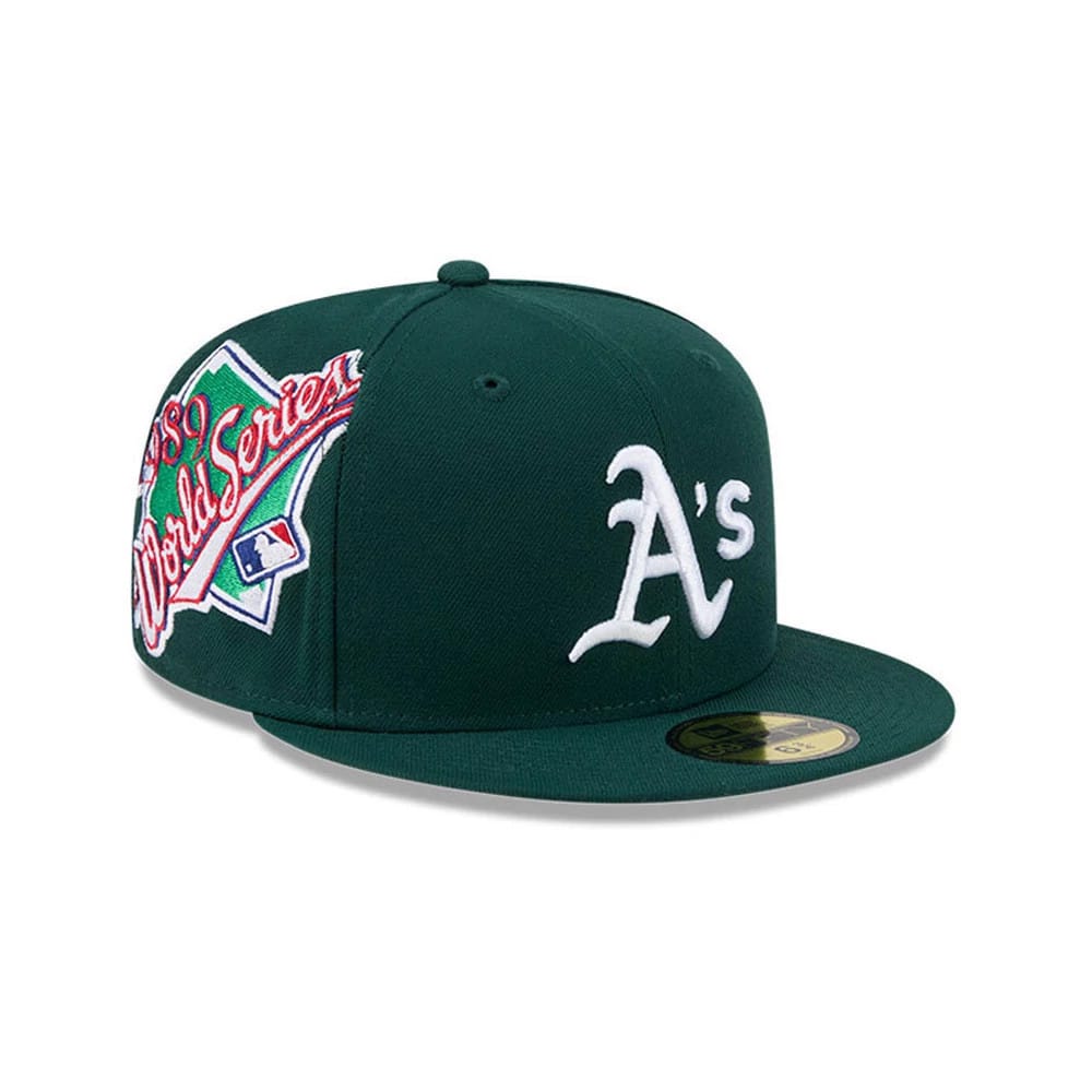 Athletics MLB Hidden Hit Dark Green New Era 59FIFTY Fitted Cap, three-quarter view showing the white embroidered A's logo on the front panel, 1989 World Series side patch, and gold 59FIFTY size sticker on the flat visor.