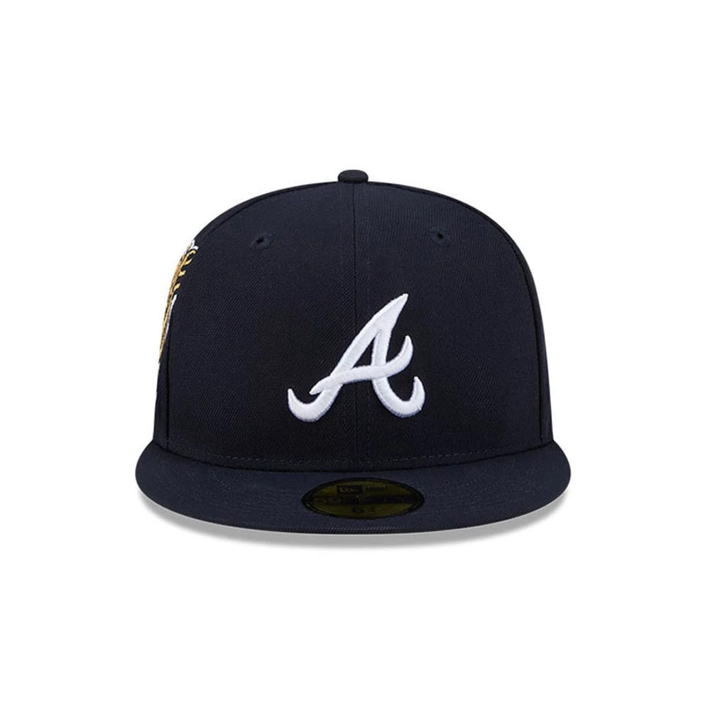 Atlanta Braves MLB Hidden Hit Navy New Era 59FIFTY Fitted Cap, front view showing the white raised embroidered A logo on the navy front panel, complemented by a matching navy flat visor with a gold 59FIFTY size sticker.