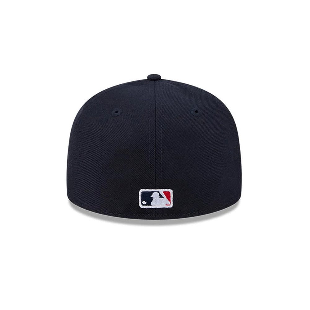 Atlanta Braves MLB Hidden Hit Navy New Era 59FIFTY Fitted Cap, rear view showing the white and red embroidered MLB Batterman logo at the centre of the navy back panels, with matching navy eyelets and a top button.