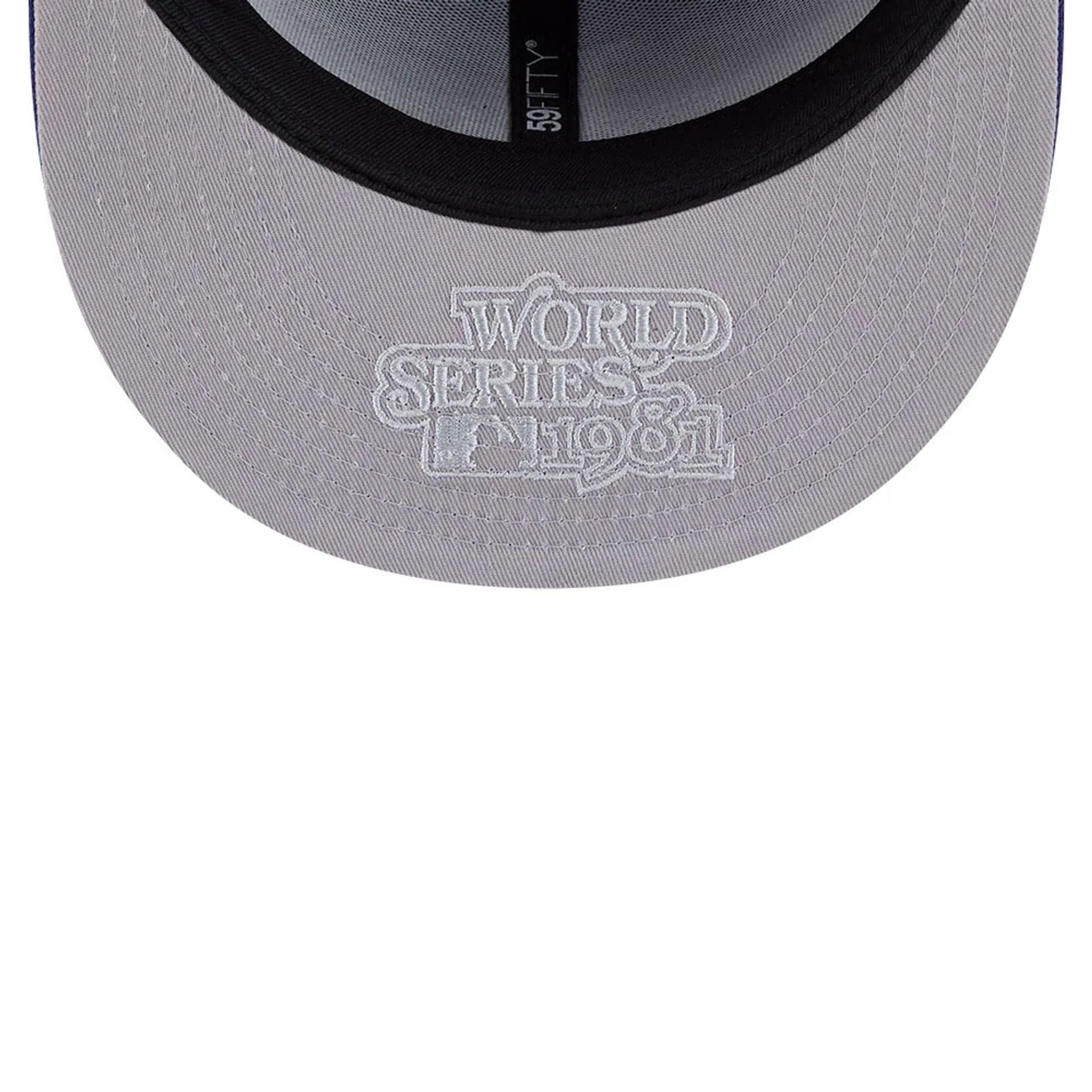 Pictured is this MLB Hidden Hit LA Dodgers 59FIFTY Fitted cap in dark blue. 2