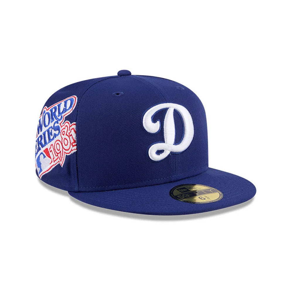 Pictured is this MLB Hidden Hit LA Dodgers Cooperstown 59FIFTY Fitted cap in dark blue. 1