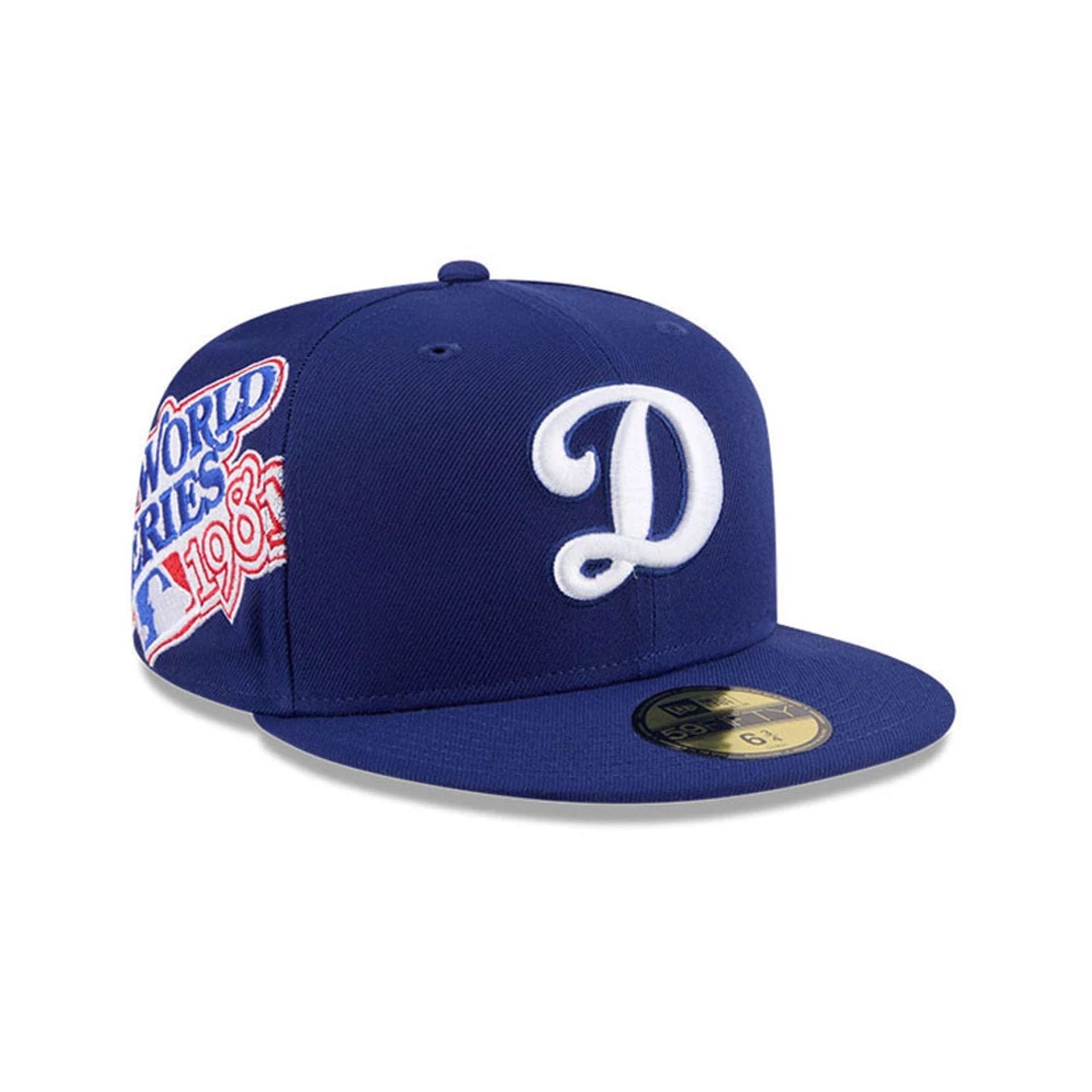 Pictured is this MLB Hidden Hit LA Dodgers 59FIFTY Fitted cap in dark blue. 1
