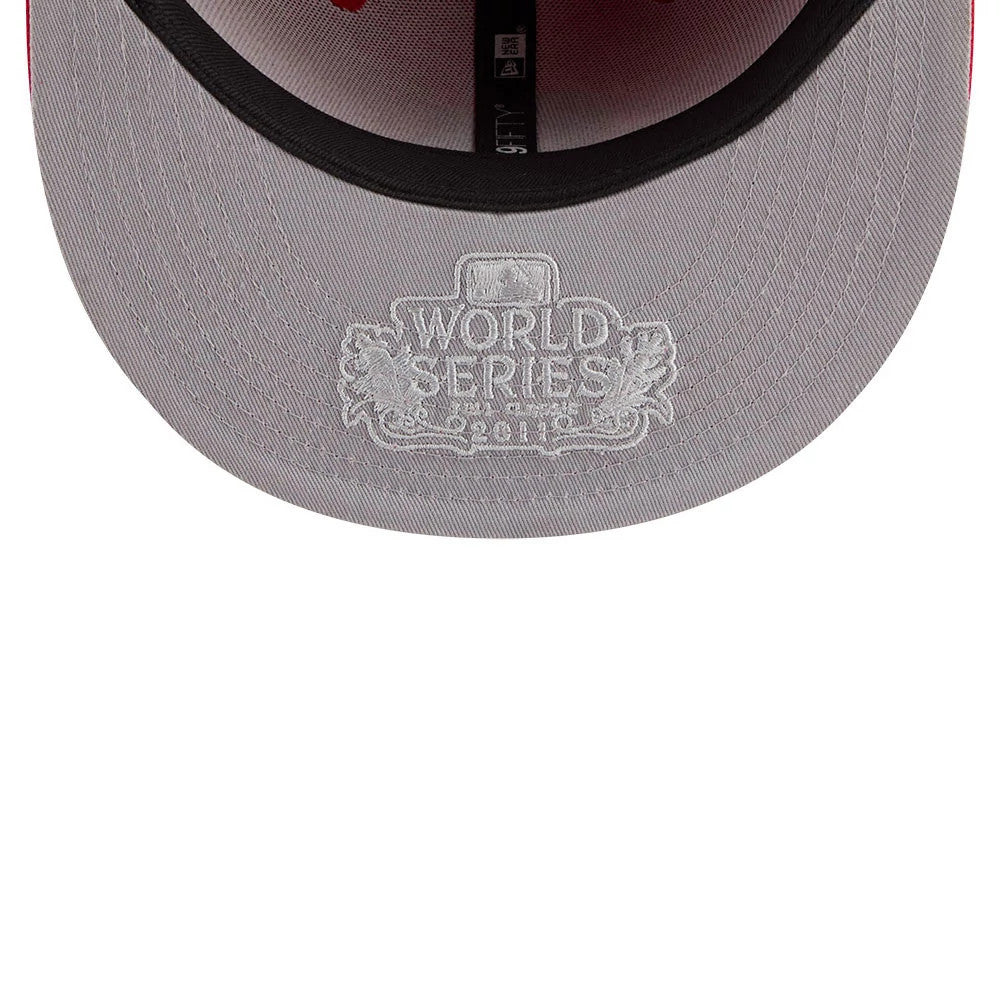 St. Louis Cardinals MLB Hidden Hit Red New Era 59FIFTY Fitted Cap, inside view showcasing the grey undervisor with World Series 2011 embroidered graphic in white, black sweatband, and brand taping through the crown.